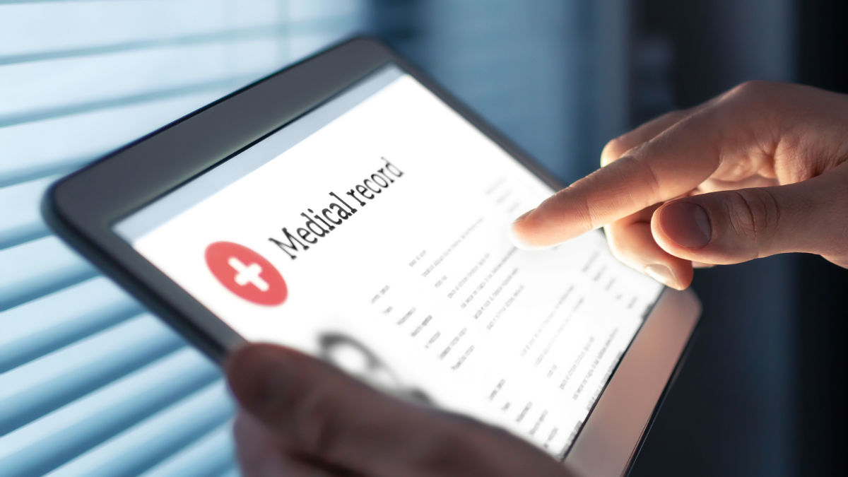 tablet with the words medical record on it