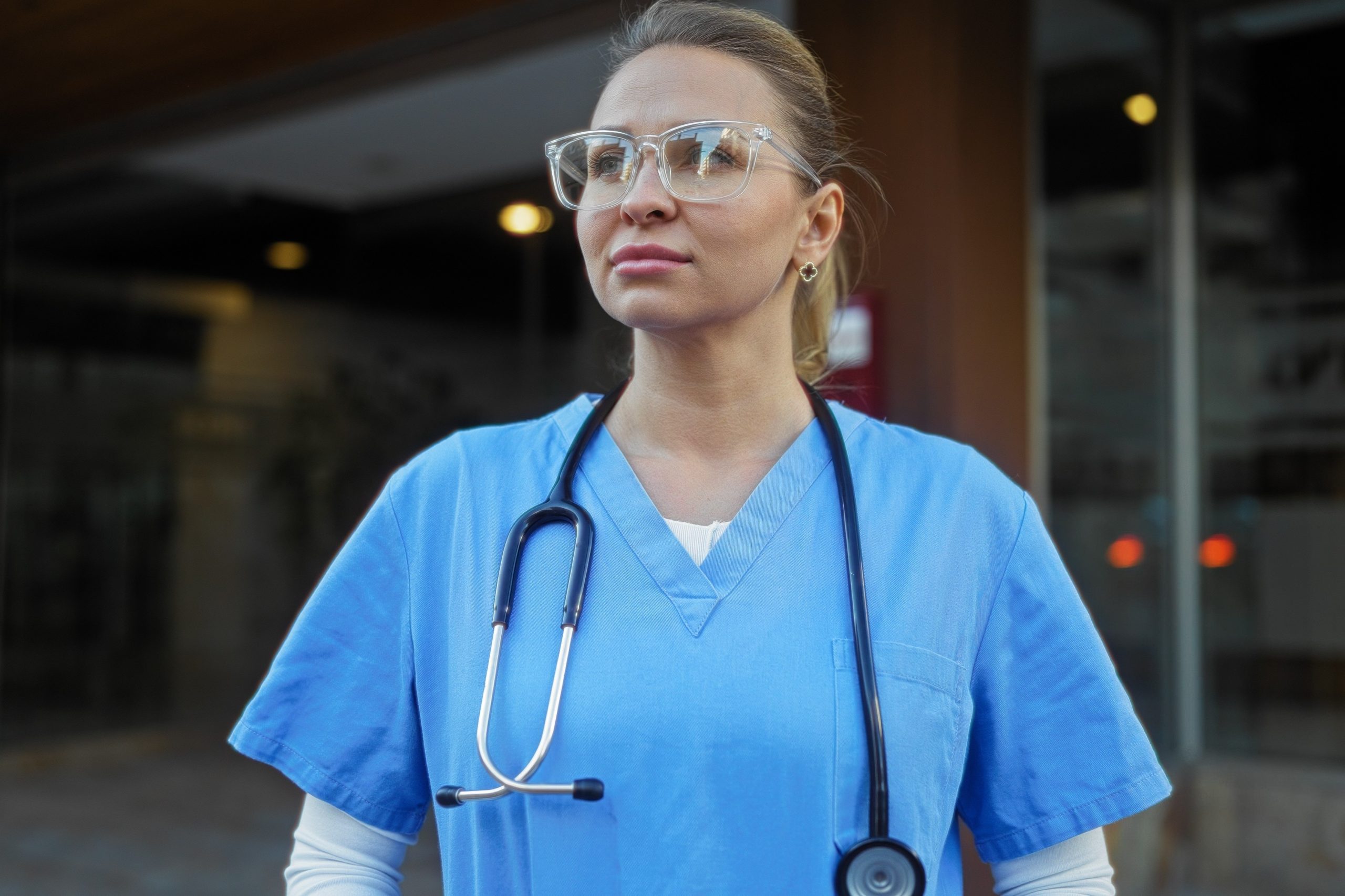 Female medical worker looking determined into the distance