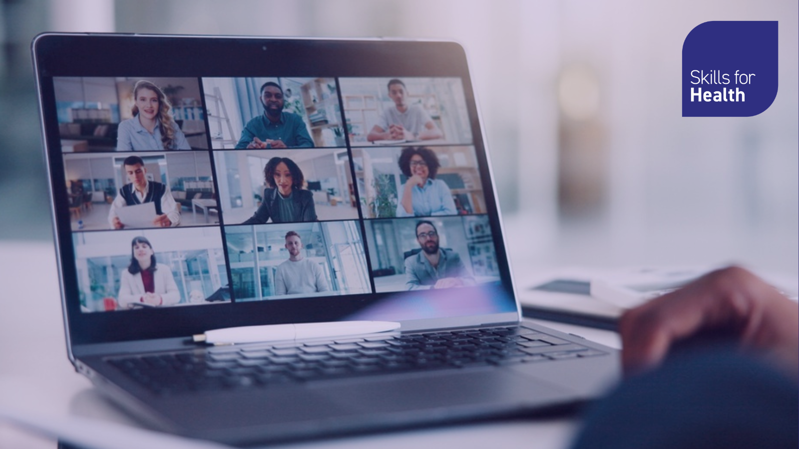 Hands, laptop screen or virtual meeting. Not from actual Six Steps Open Programme workforce planning but illustrating how it might look