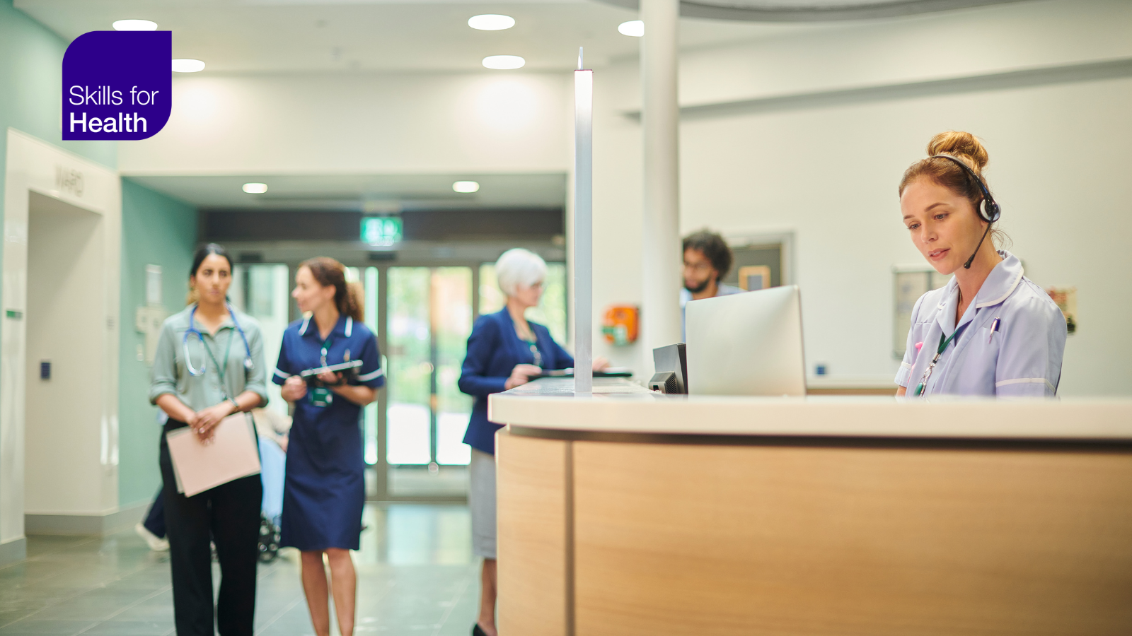 hospital reception busy with medical workers