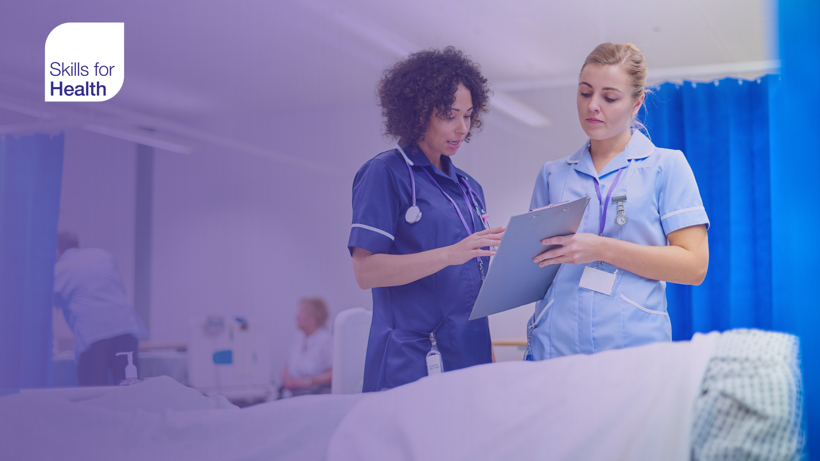 two medical works checking patient chart
