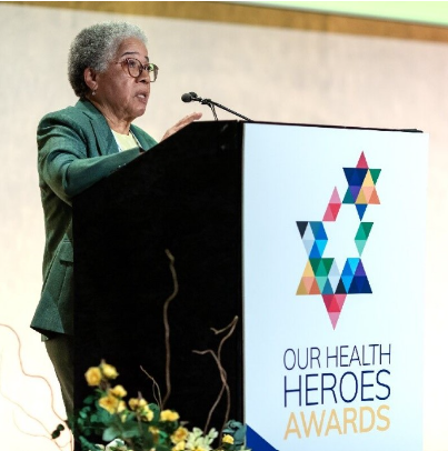 Anionwu presenting at Our Health Heroes awards
