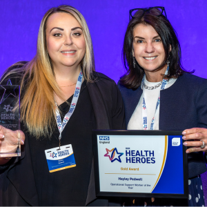 Photo of Hayley Pedwell Gold winner of Our Health Heroes 2025 Operational Support Worker of the Year, standing next to Dr Dawn Harper