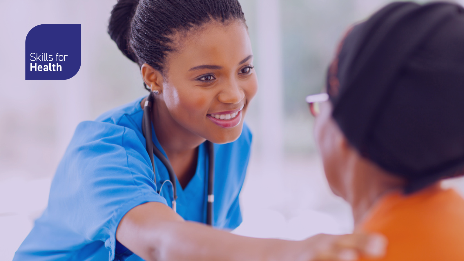 caring medical nurse comforting senior patient in office
